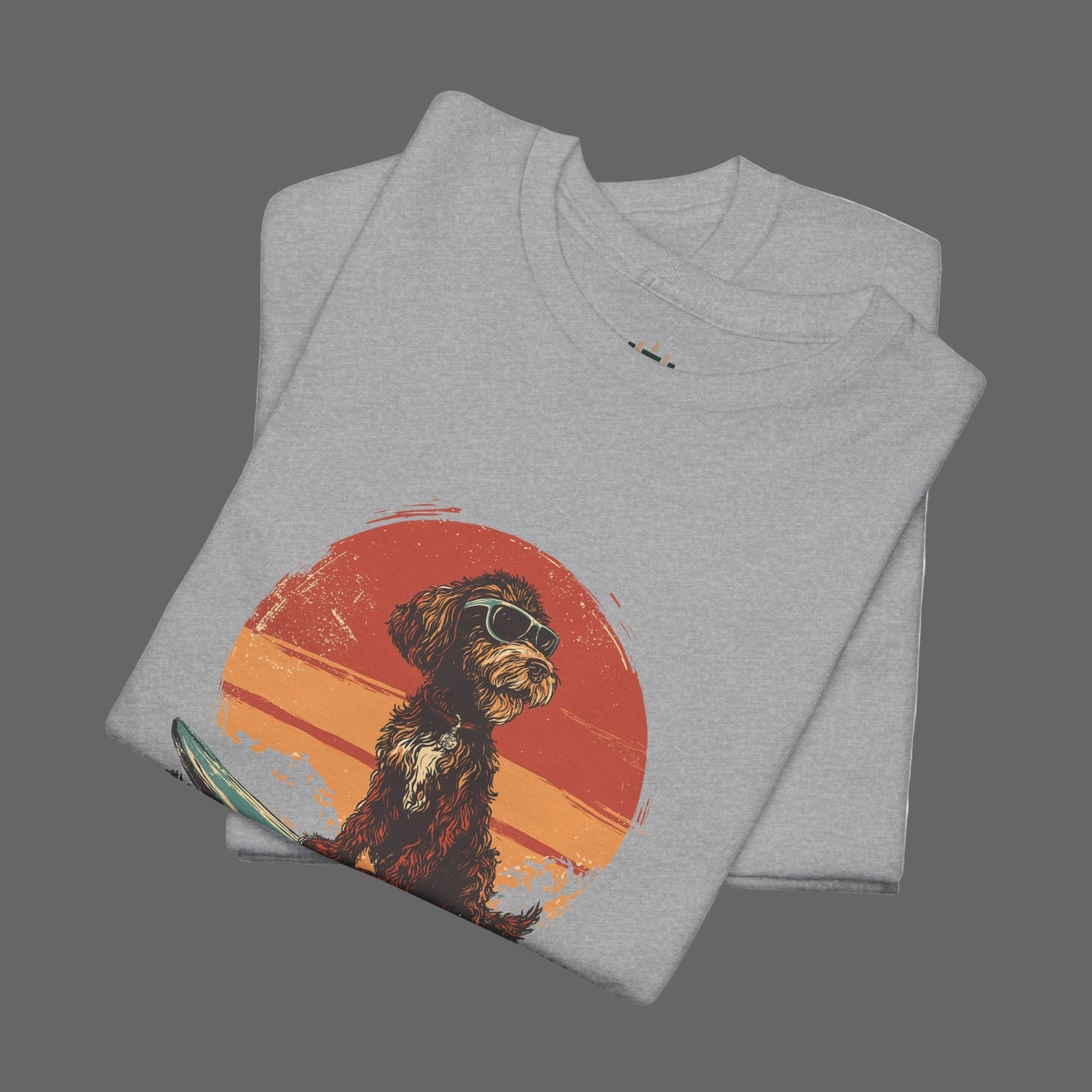 Folded gray t-shirt with a dog graphic on a white background