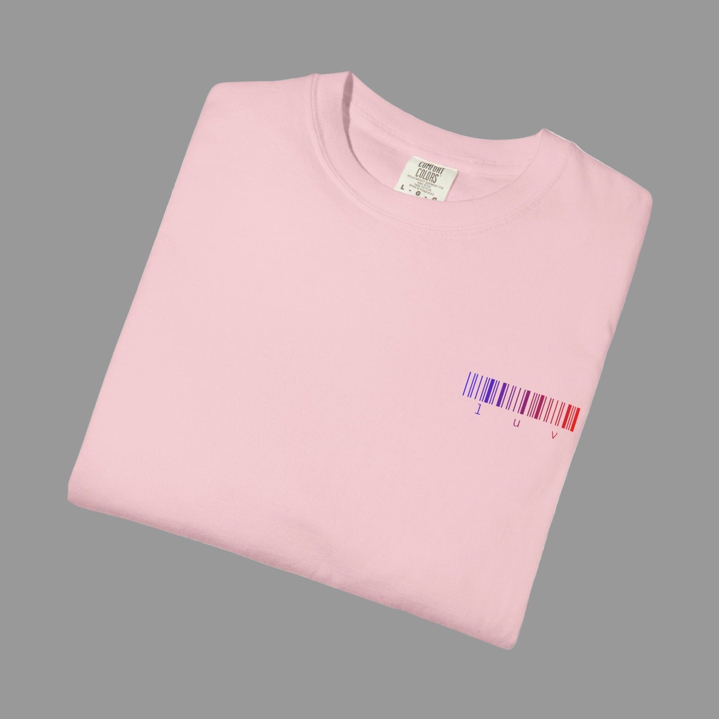 Folded pink t-shirt with a barcode design on a white background