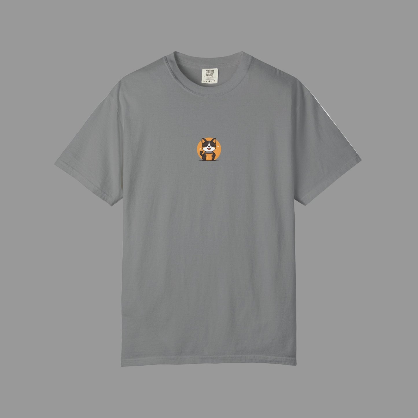 Blue t-shirt with a small dog graphic on a white background