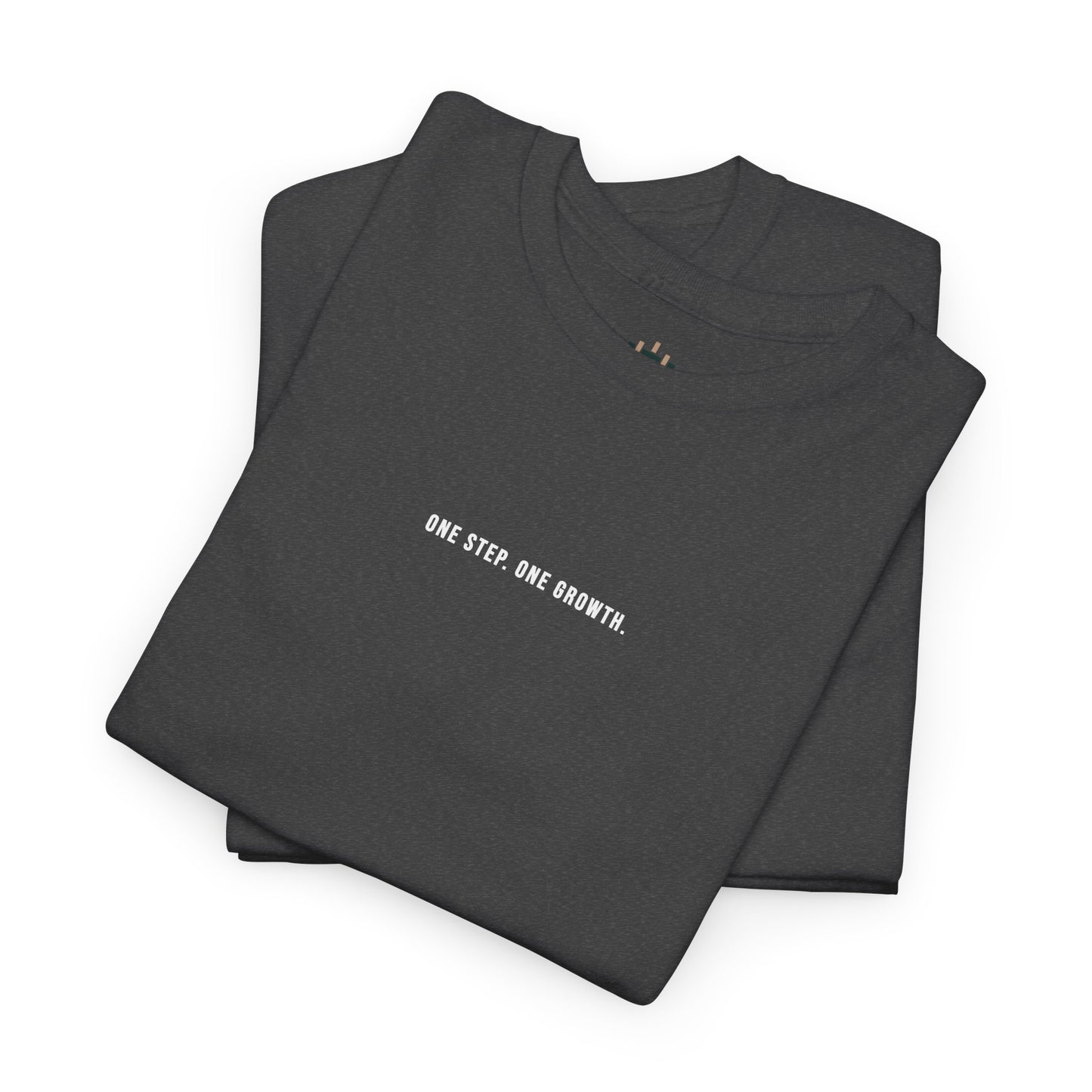 Folded black t-shirt with 'ONE STEP. ONE GROWTH.' text on a white background