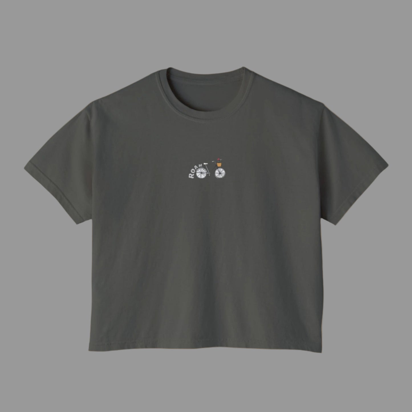 Dark gray t-shirt with a small graphic on a white background