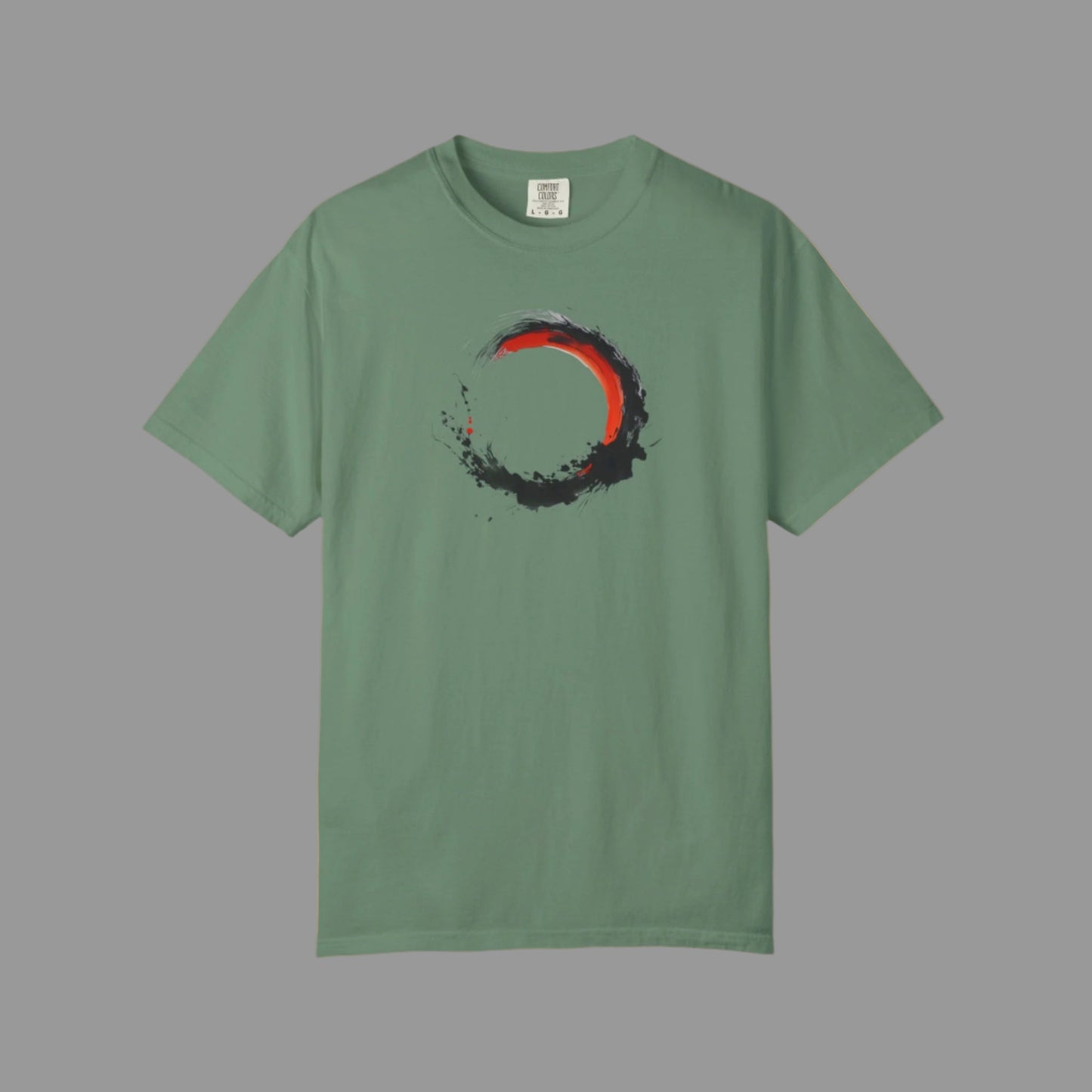 Green t-shirt with a black and red circular design on a white background