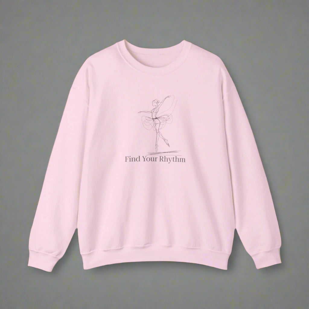Pink sweatshirt with a graphic and text 'Find Your Rhythm' on a white background