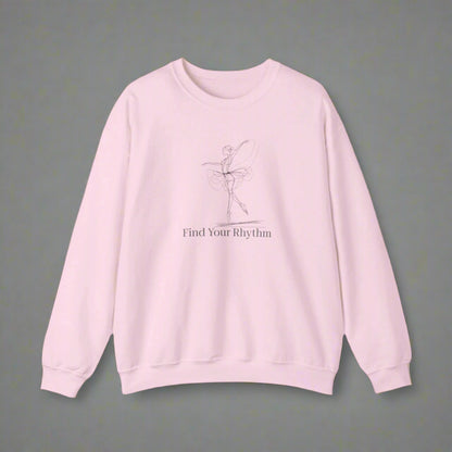 Pink sweatshirt with a graphic and text 'Find Your Rhythm' on a white background