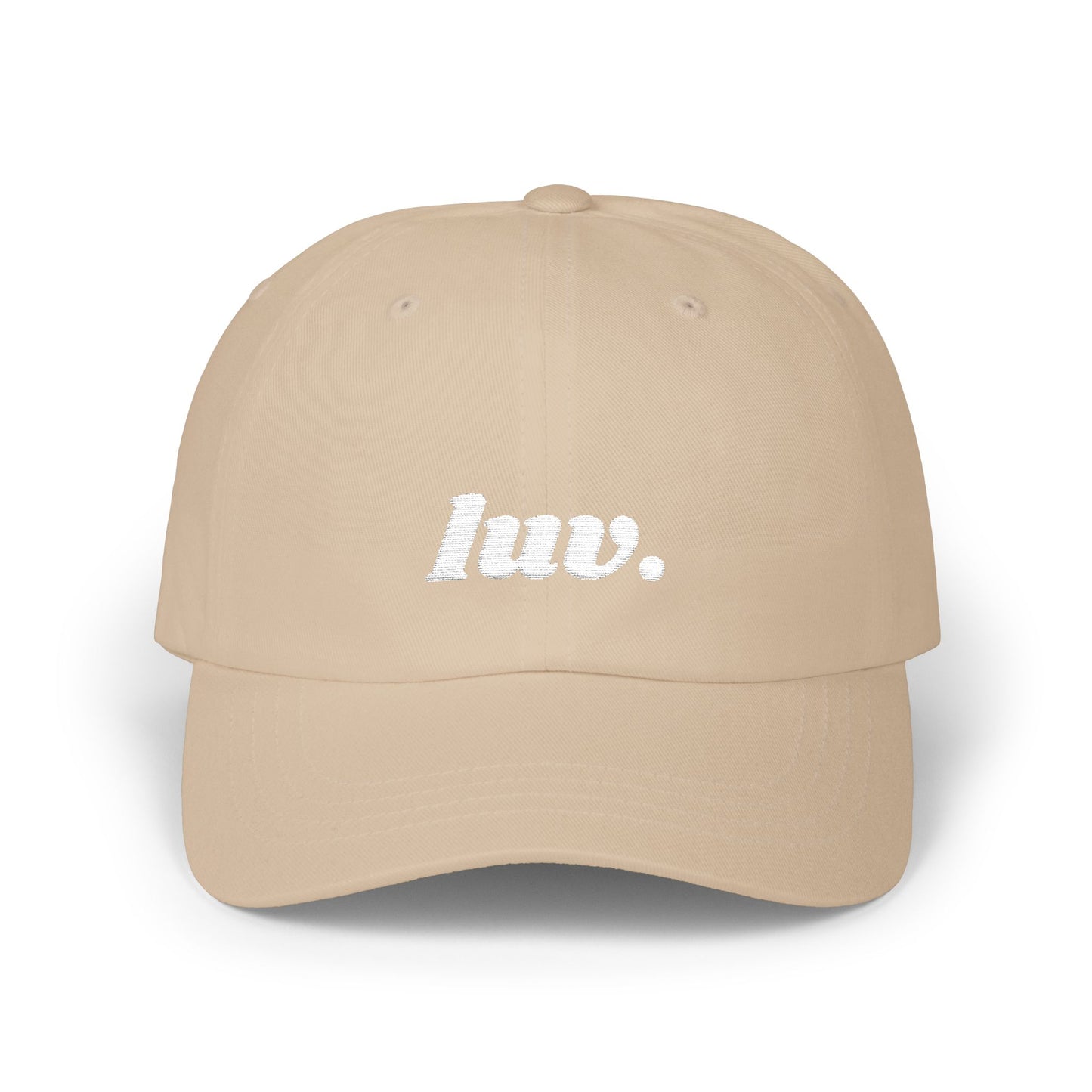 Beige cap with 'luv.' text on a white background