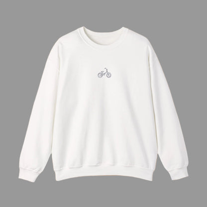 White sweatshirt with a small bicycle logo on a white background