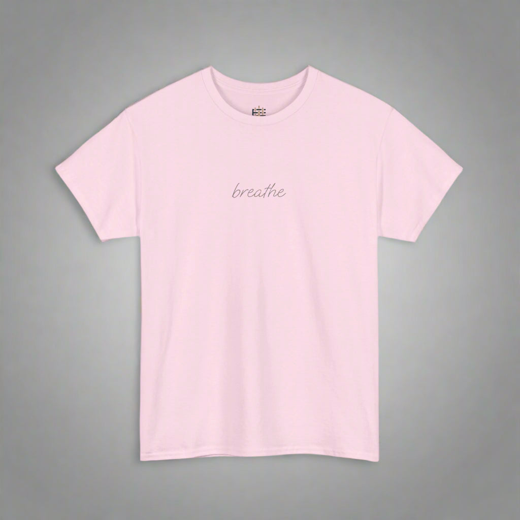 Pink t-shirt with 'breathe' text on a white background