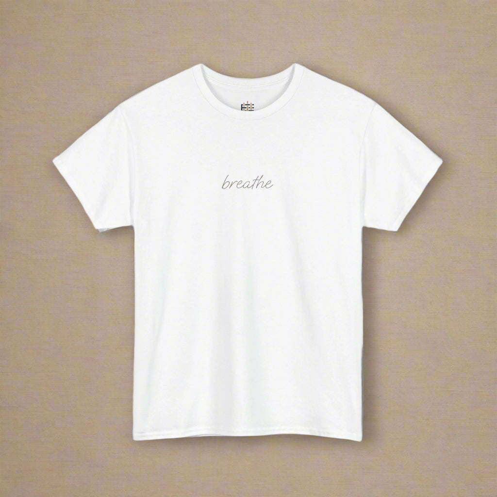 White t-shirt with 'breathe' text on a white background