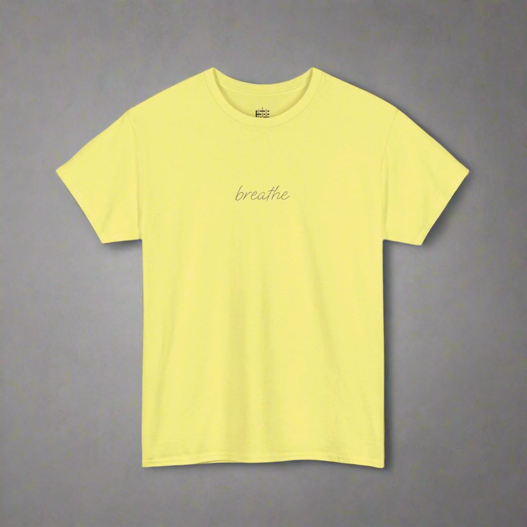 Yellow t-shirt with 'breathe' text on a white background