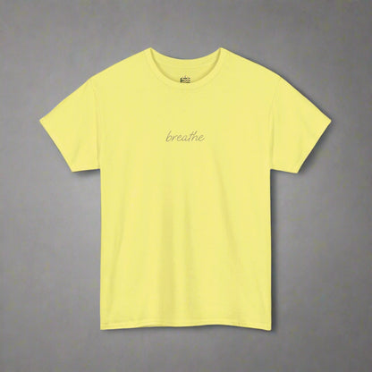 Yellow t-shirt with 'breathe' text on a white background