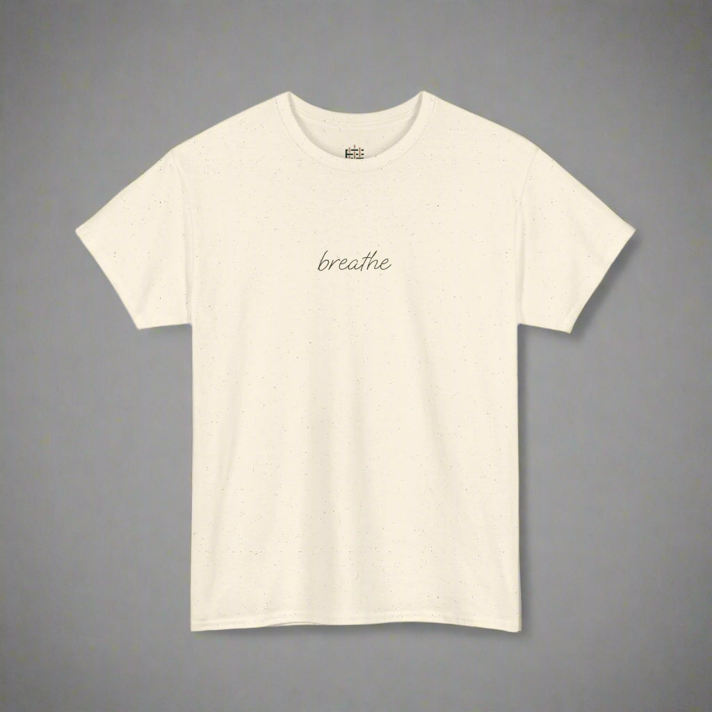 Beige t-shirt with 'breathe' text on a white background