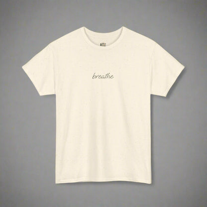 Beige t-shirt with 'breathe' text on a white background