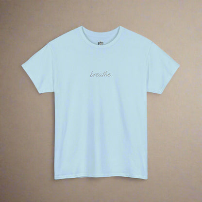 Light blue t-shirt with 'breathe' text on a white background