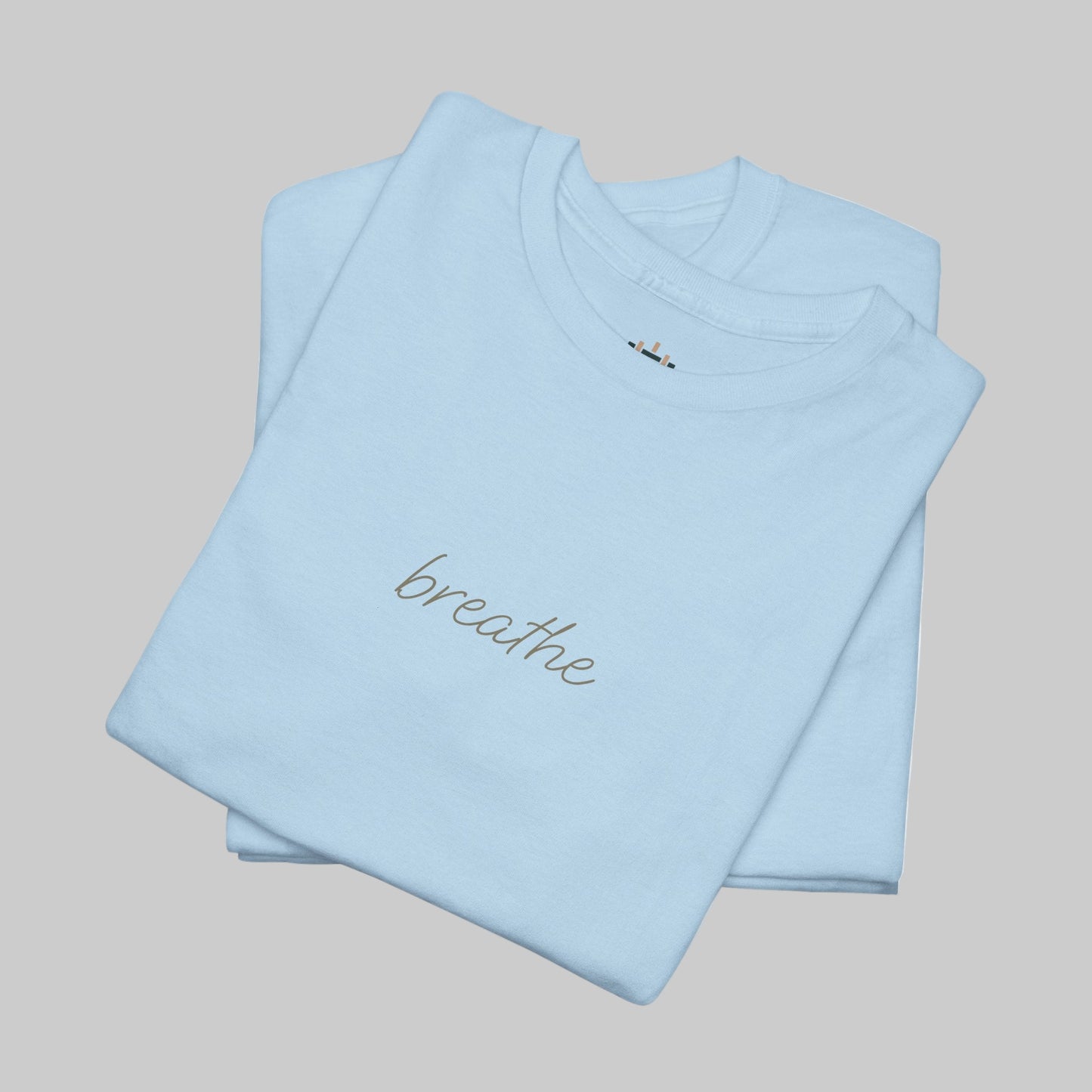 Light blue t-shirt with 'breathe' text on a white background