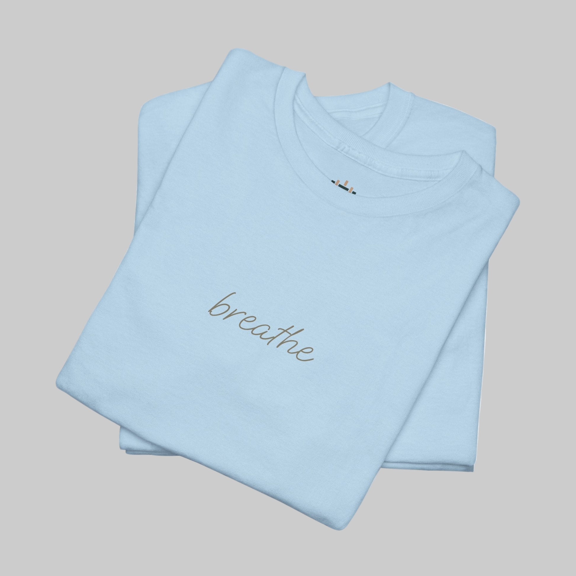 Light blue t-shirt with 'breathe' text on a white background