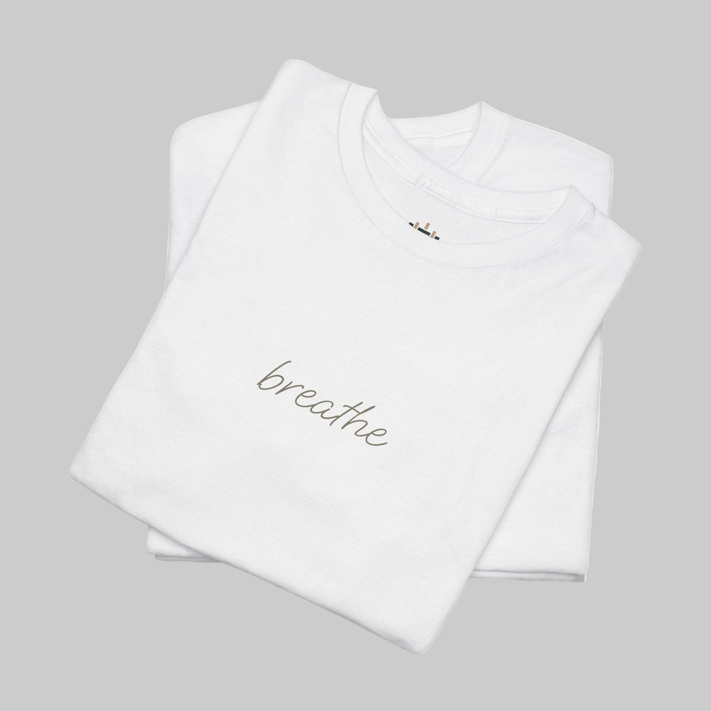 White t-shirt with 'breathe' text on a white background