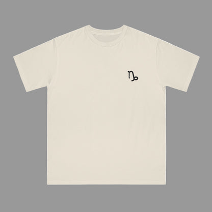 Beige t-shirt with a black symbol on the chest against a white background