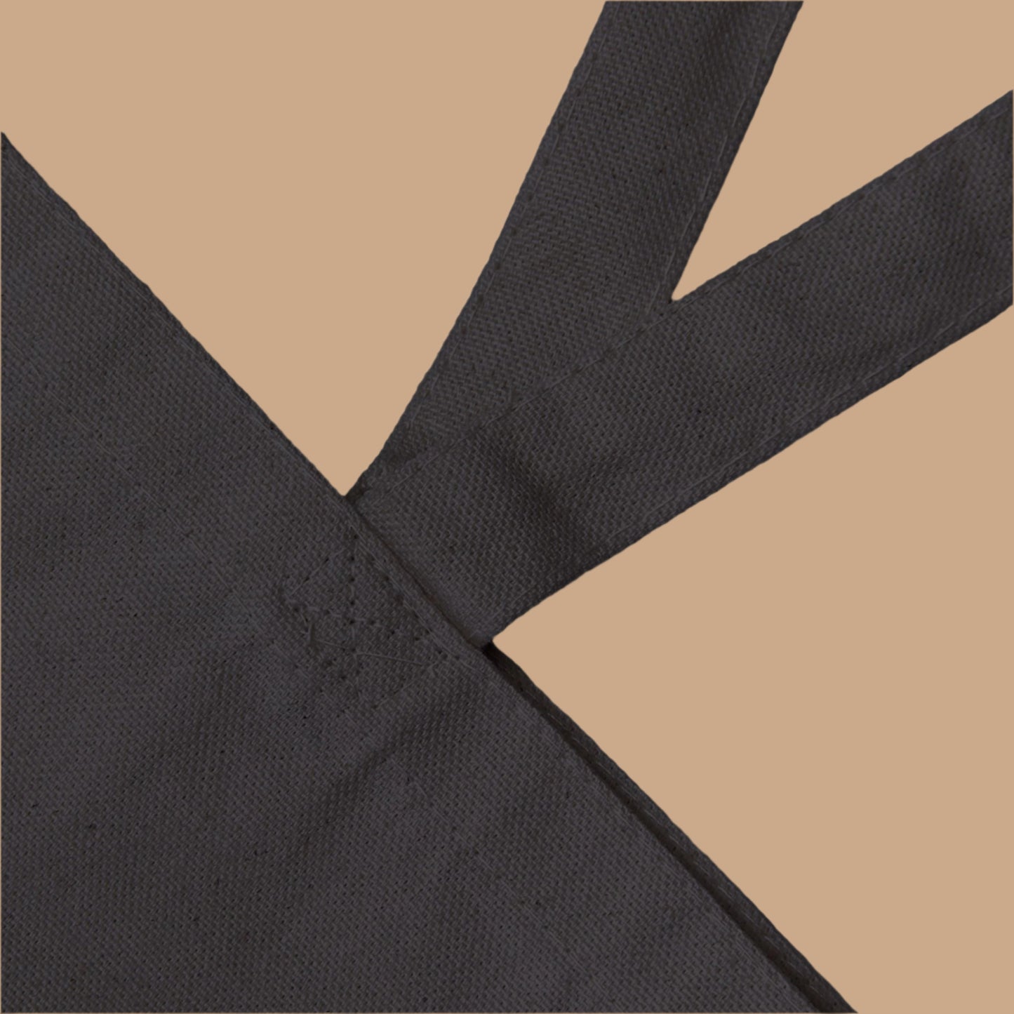 Black fabric with a subtle pattern on a white background