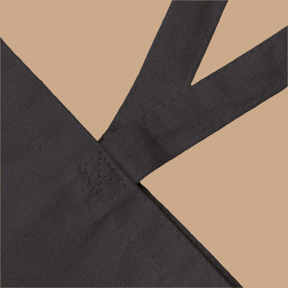 Black fabric with a subtle pattern on a white background