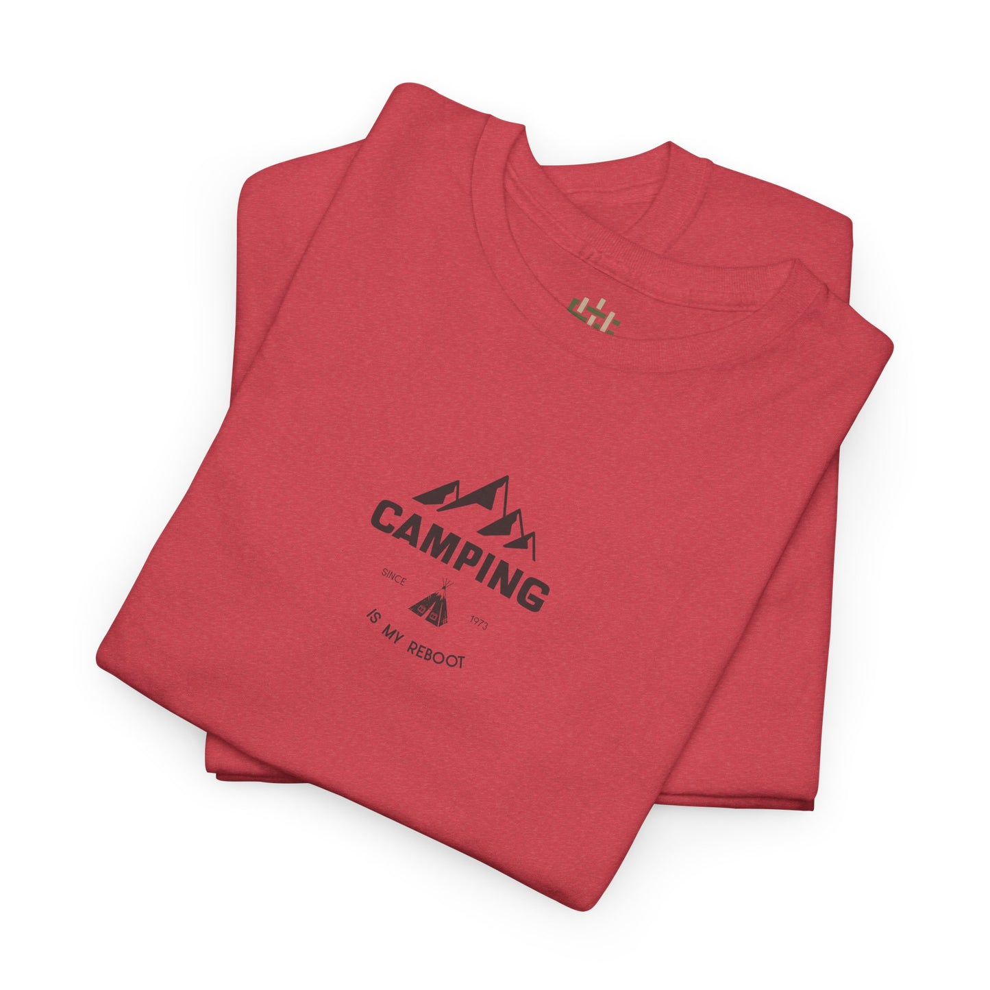 Folded red t-shirt with 'Camping is my religion' text on a white background