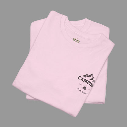 Folded pink t-shirt with a logo on a white background