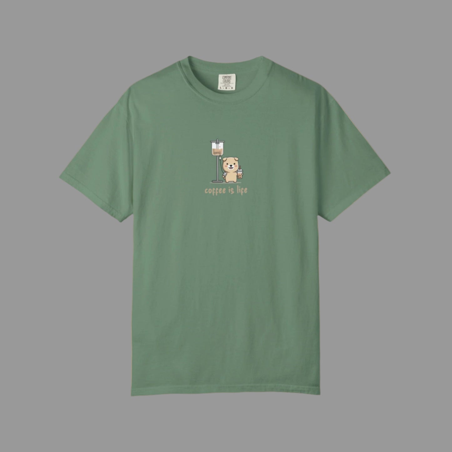 Green t-shirt with a bear and coffee cup graphic on a white background