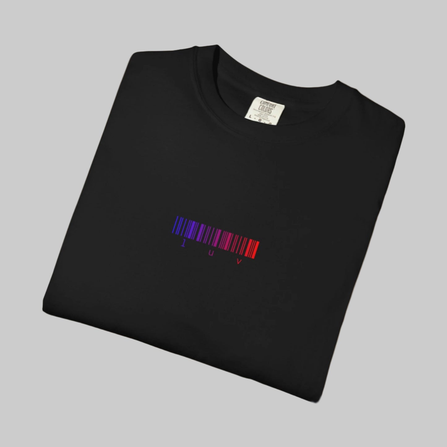 Folded black t-shirt with a colorful barcode design on a white background