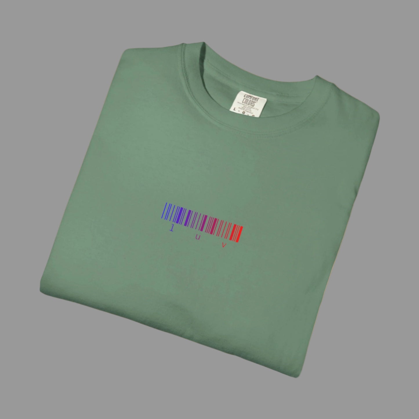 Folded green t-shirt with a barcode design on a white background