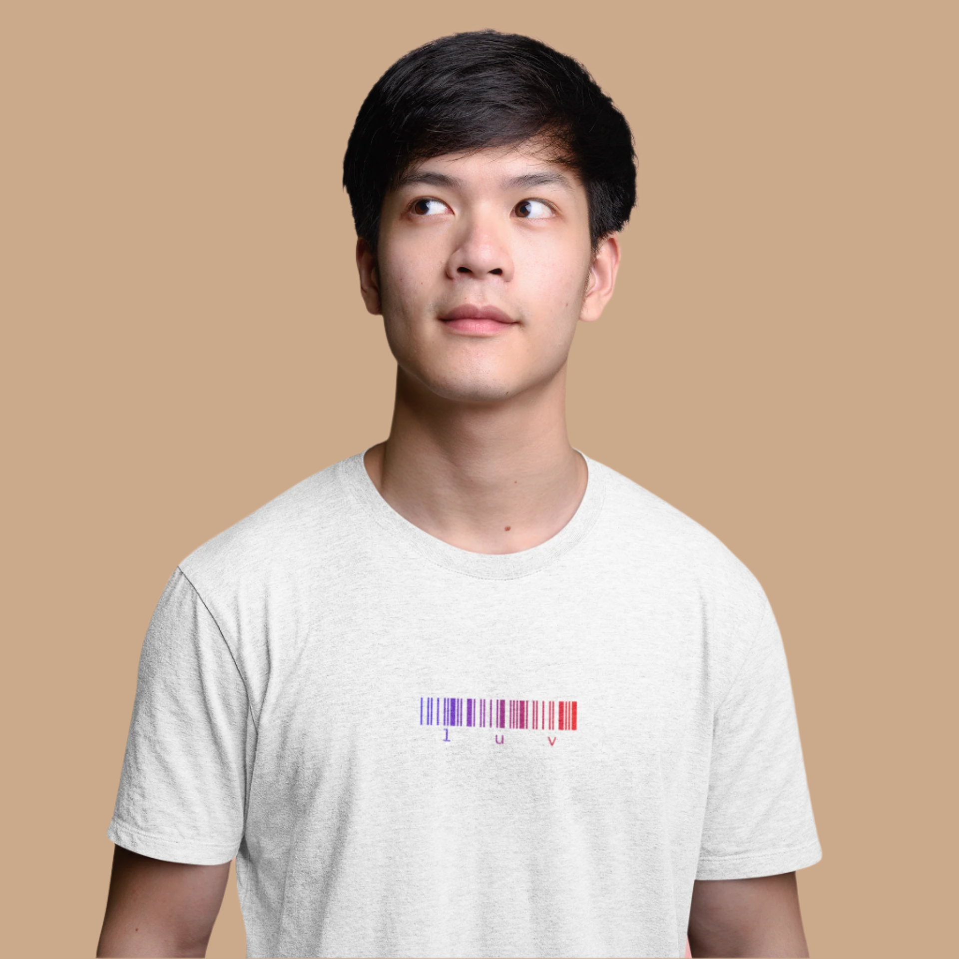 Person wearing a white t-shirt with a colorful barcode design on a pink background