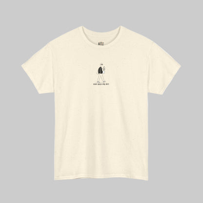 Beige t-shirt with a small black graphic and text on a white background
