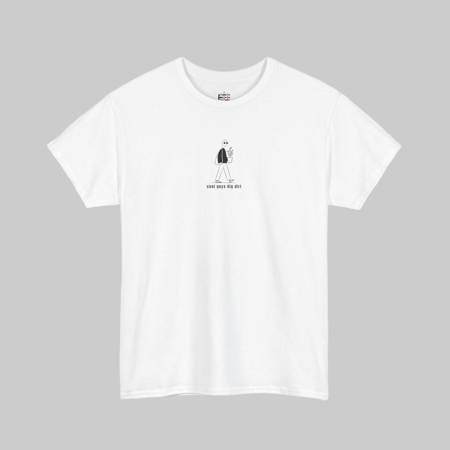 White t-shirt with a small black graphic on a white background