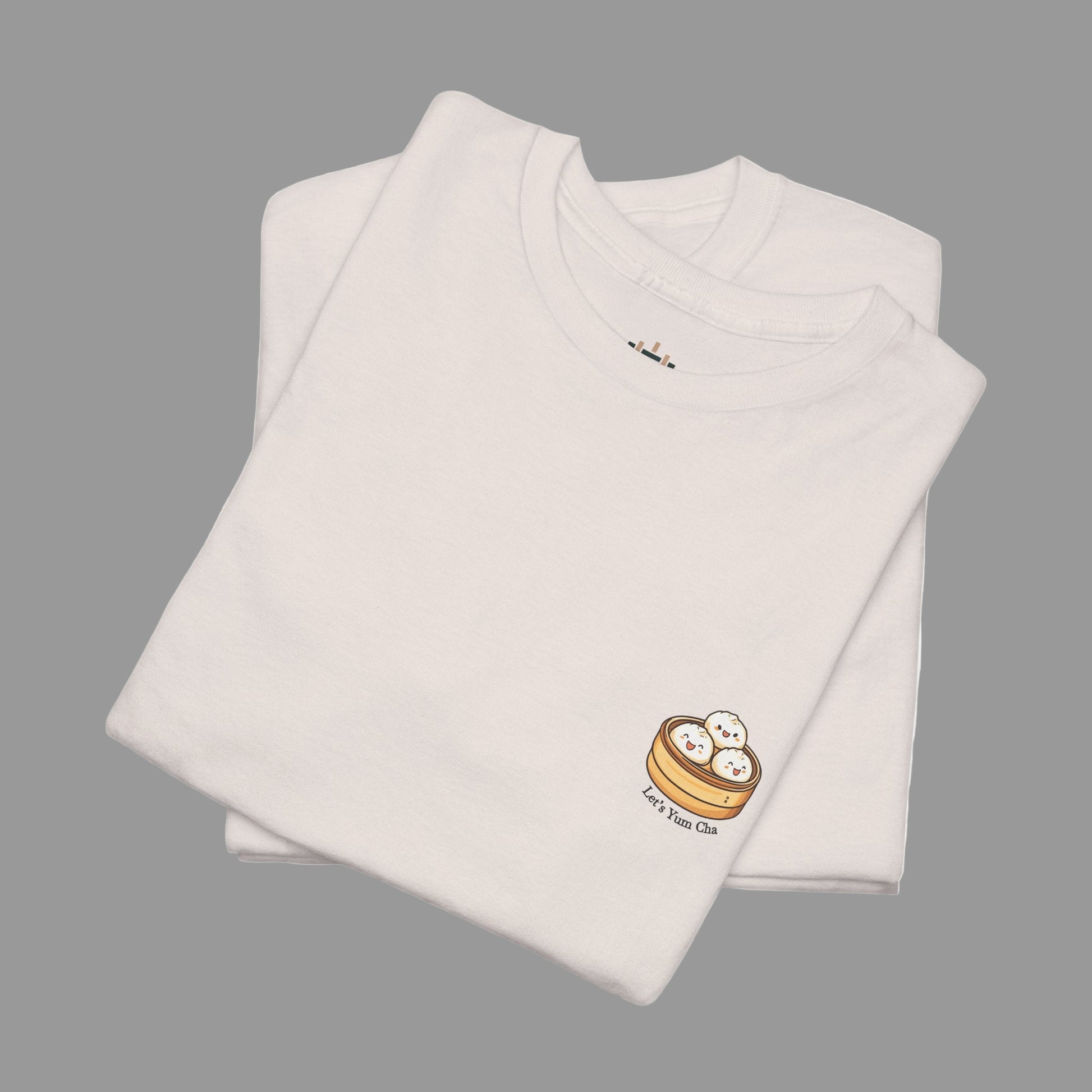 Folded beige t-shirt with a logo on a white background