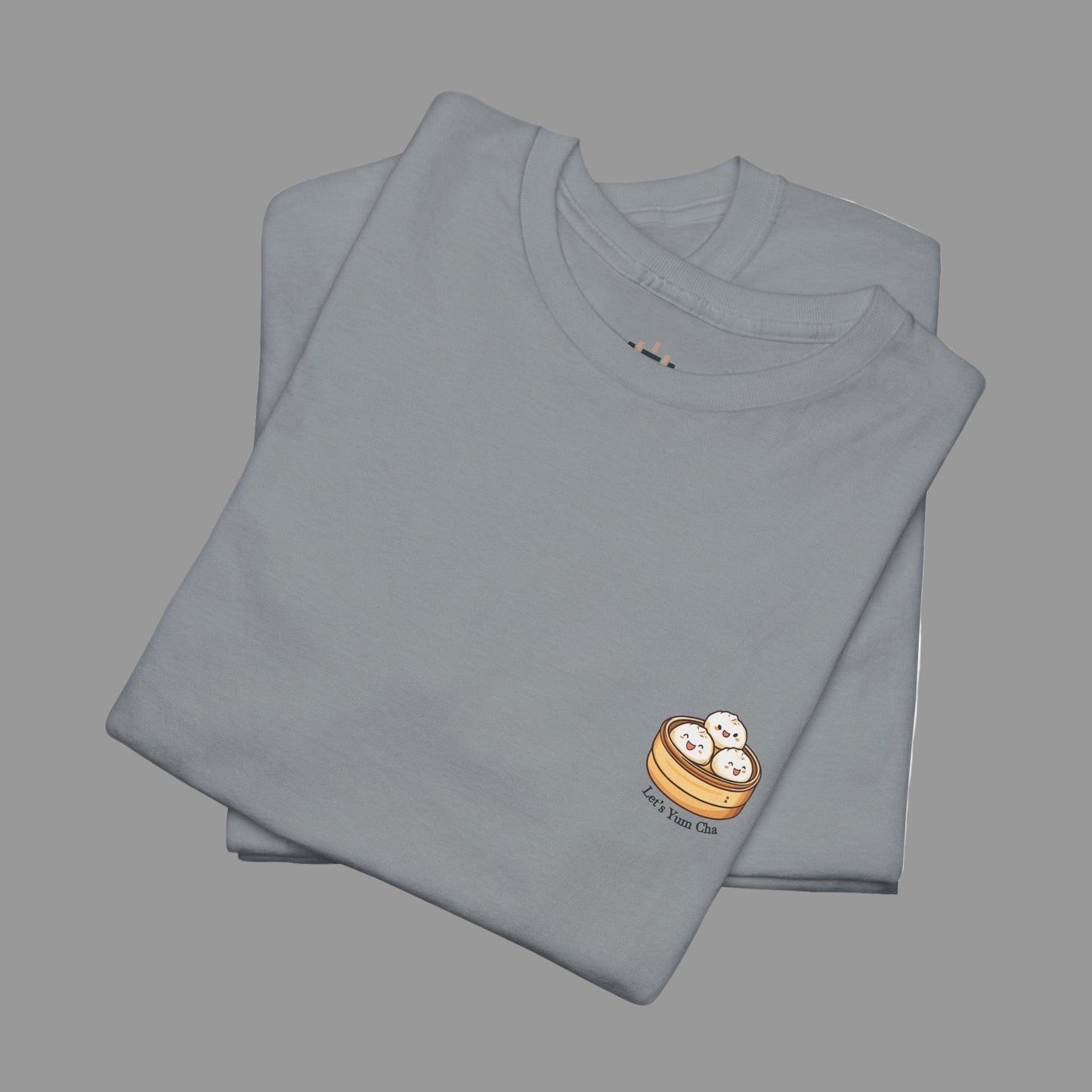 Folded gray t-shirt with a small logo on a white background