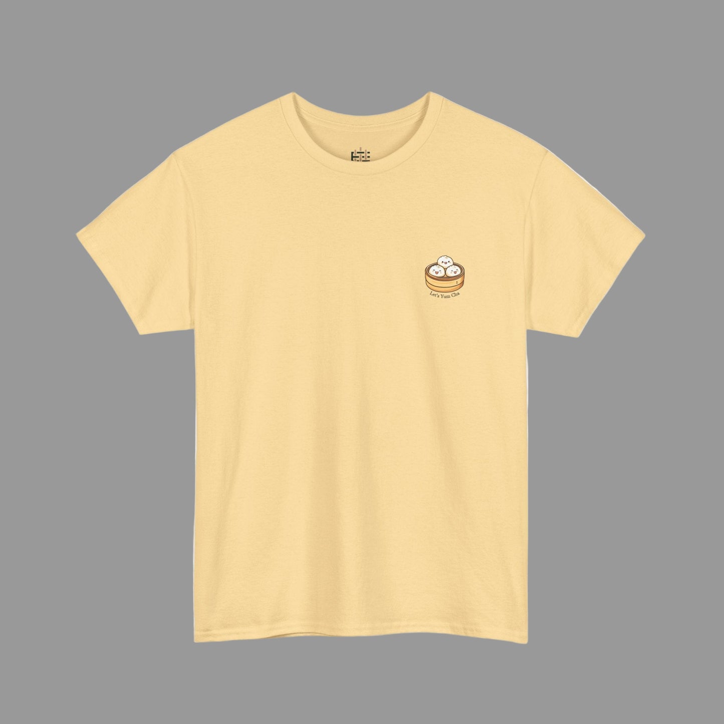 Yellow t-shirt with a small graphic on the chest against a white background