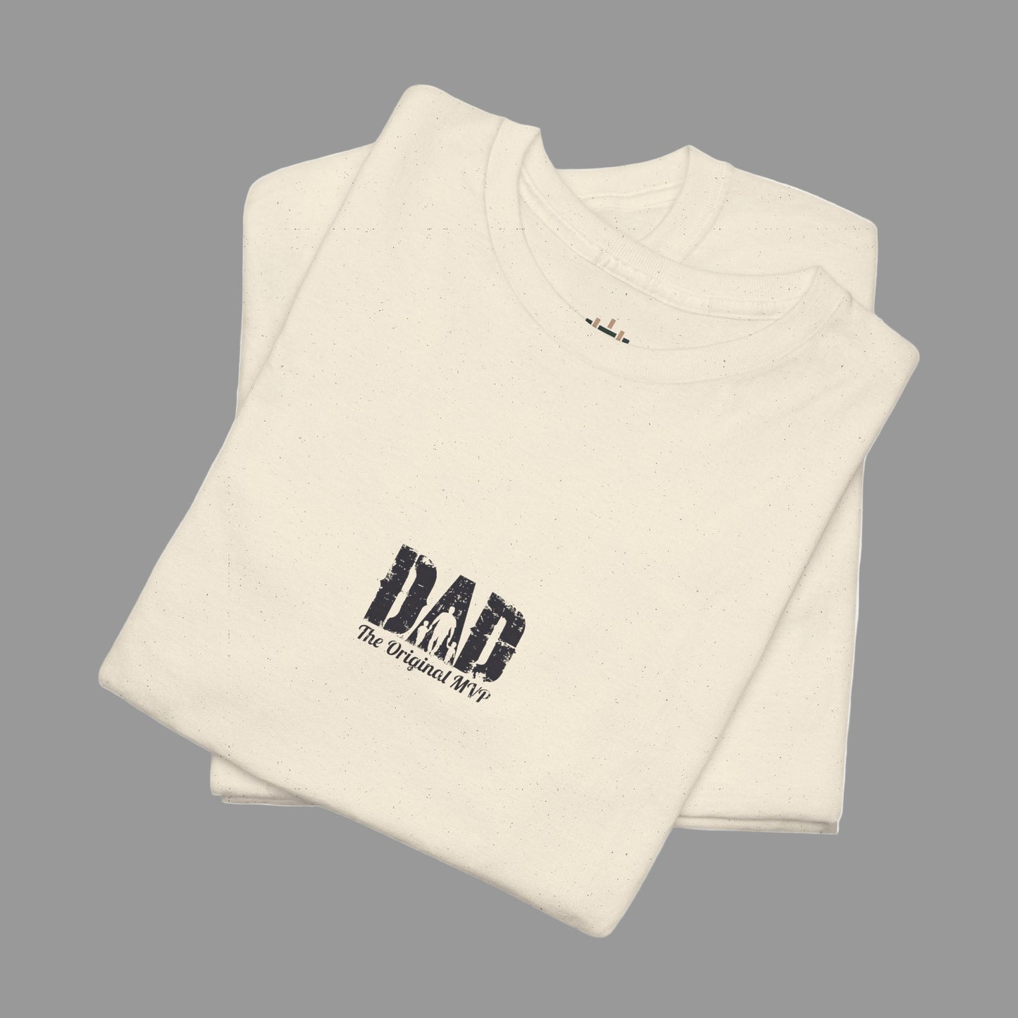 Folded beige t-shirt with 'DAD The Original MVP' text on a white background