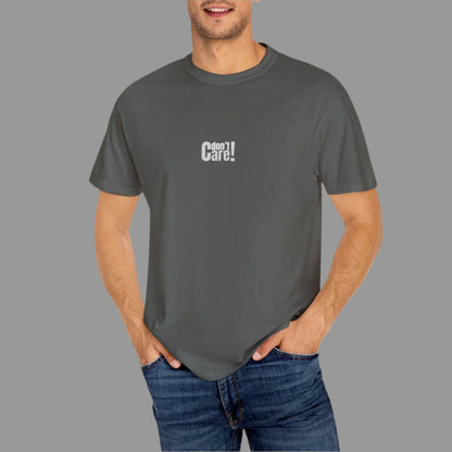 Man wearing a gray t-shirt with 'I don't care' text on a white background