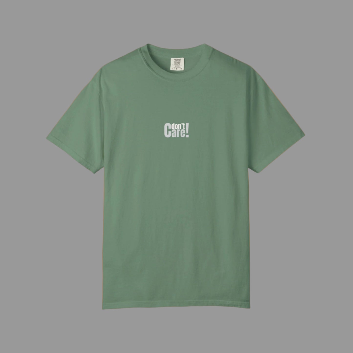 Green t-shirt with 'I don't care!' text on a white background