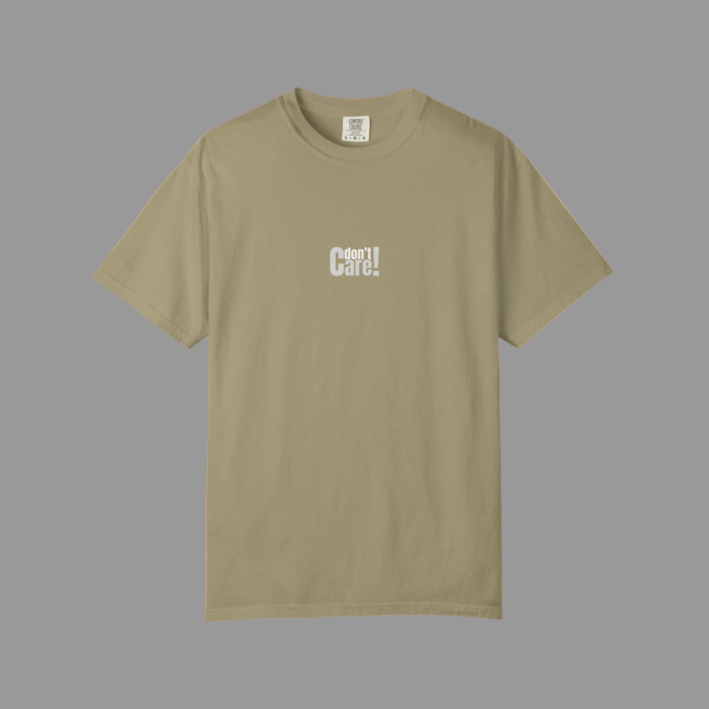 Beige t-shirt with 'I don't care!' text on a white background