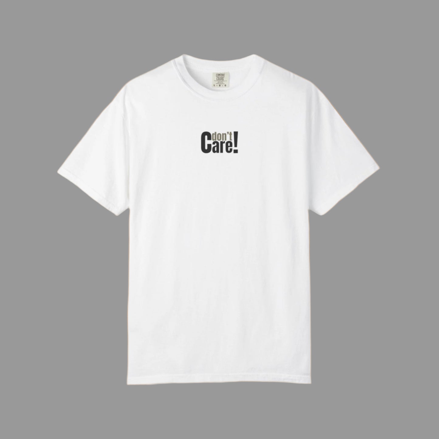 White t-shirt with 'don't care!' text on a white background