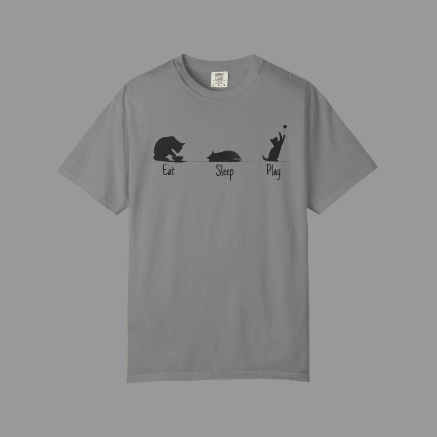 Gray t-shirt with black cat illustrations and text 'Eat Sleep Play' on a white background