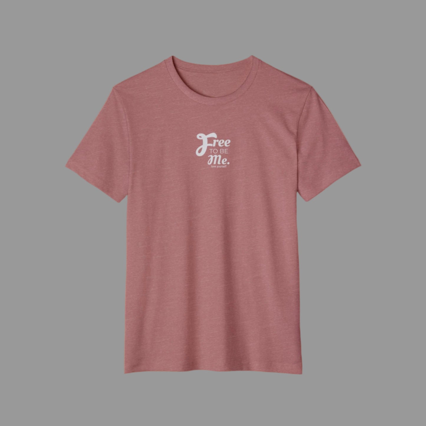 Mauve t-shirt with 'Free To Be Me' text on a white background