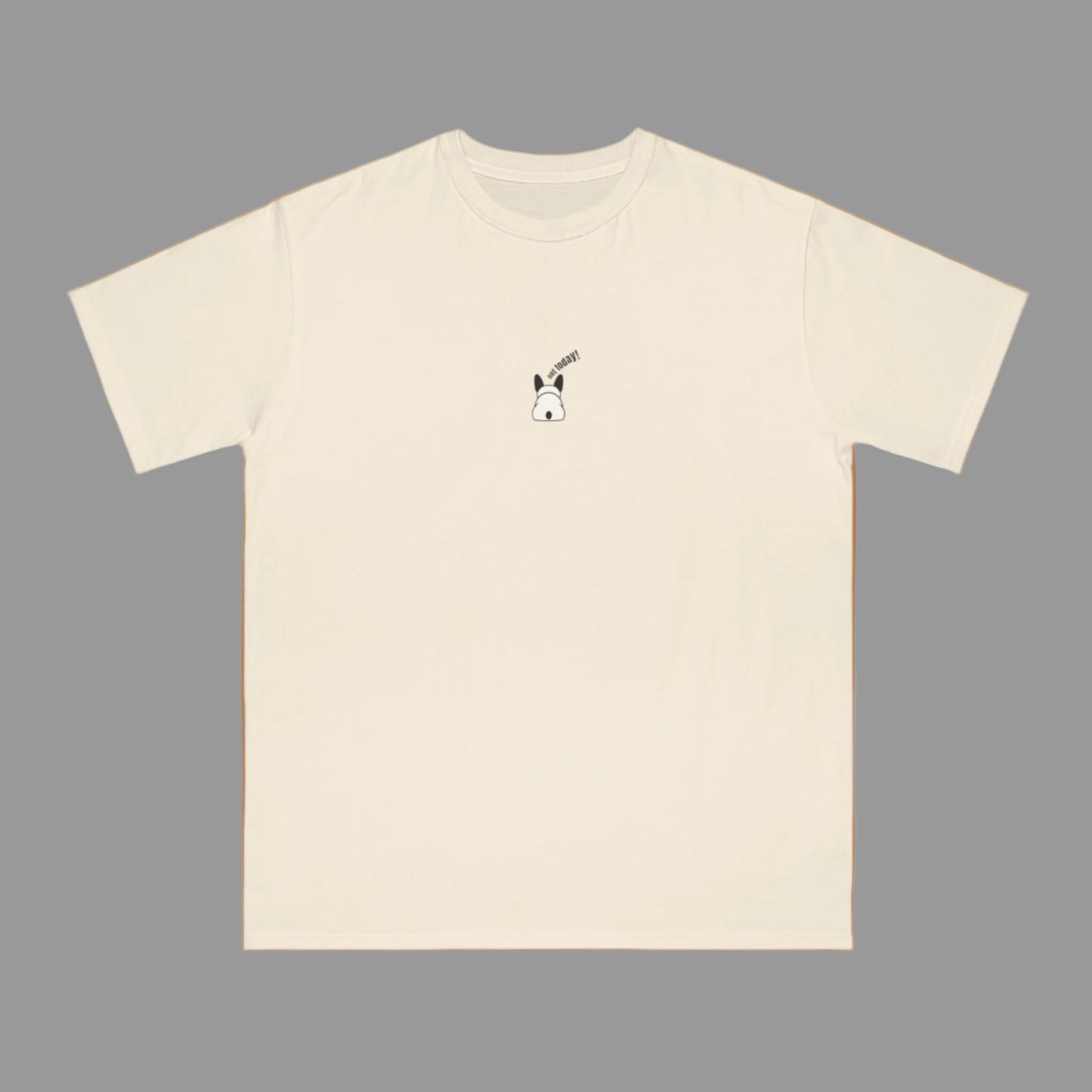 Beige t-shirt with a small graphic on a white background