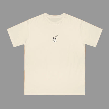 Beige t-shirt with a small graphic on a white background