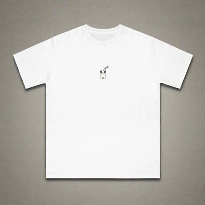 White t-shirt with a small black and white graphic on a white background