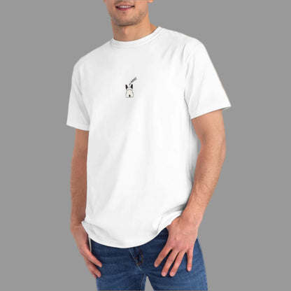 Man wearing a white t-shirt with a small logo on a white background