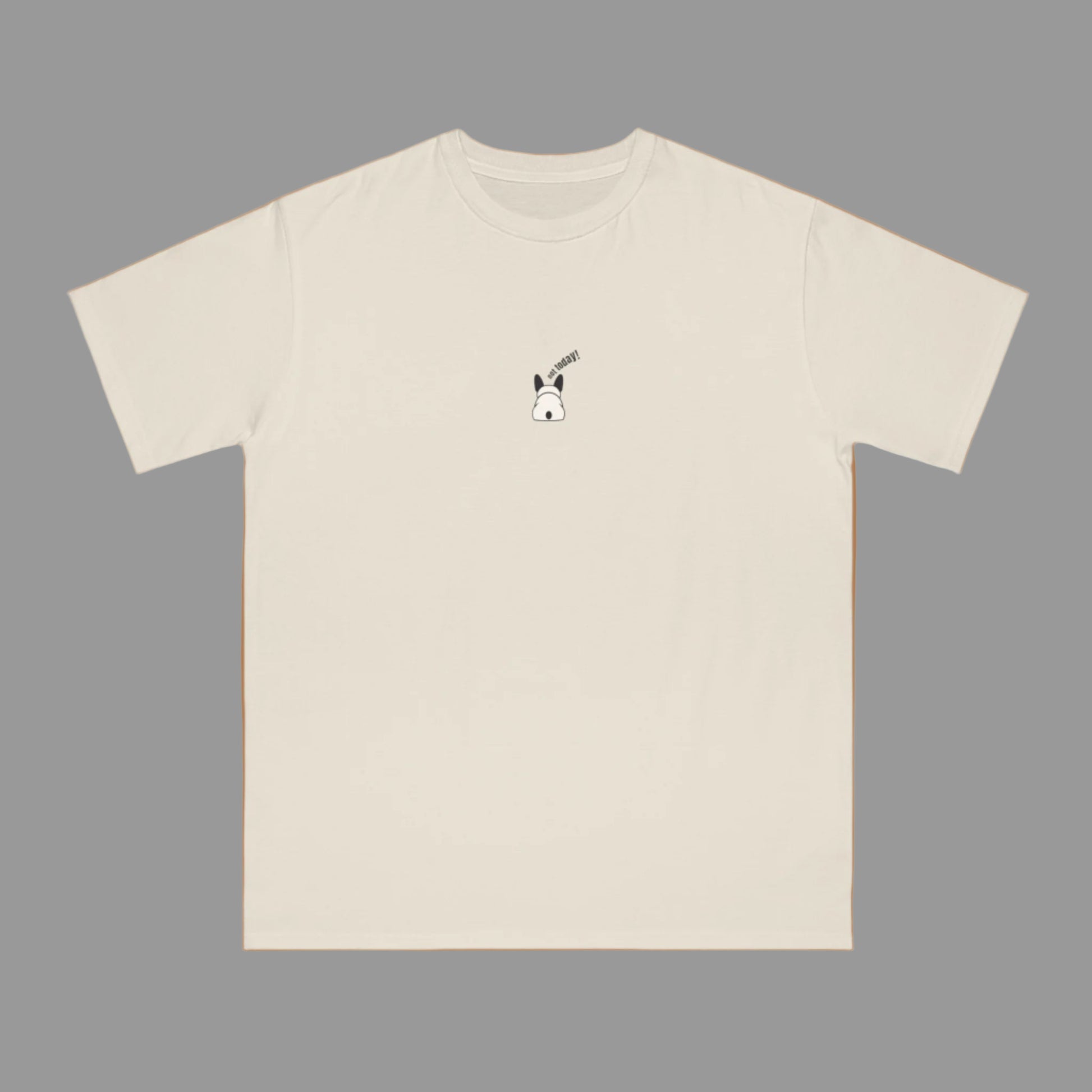 Beige t-shirt with a small dog graphic on a white background