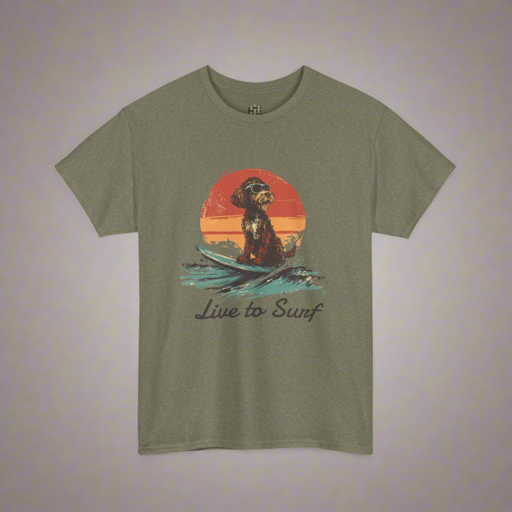 Olive green t-shirt with a graphic of a dog on a surfboard and 'Live to Surf' text, on a white background.