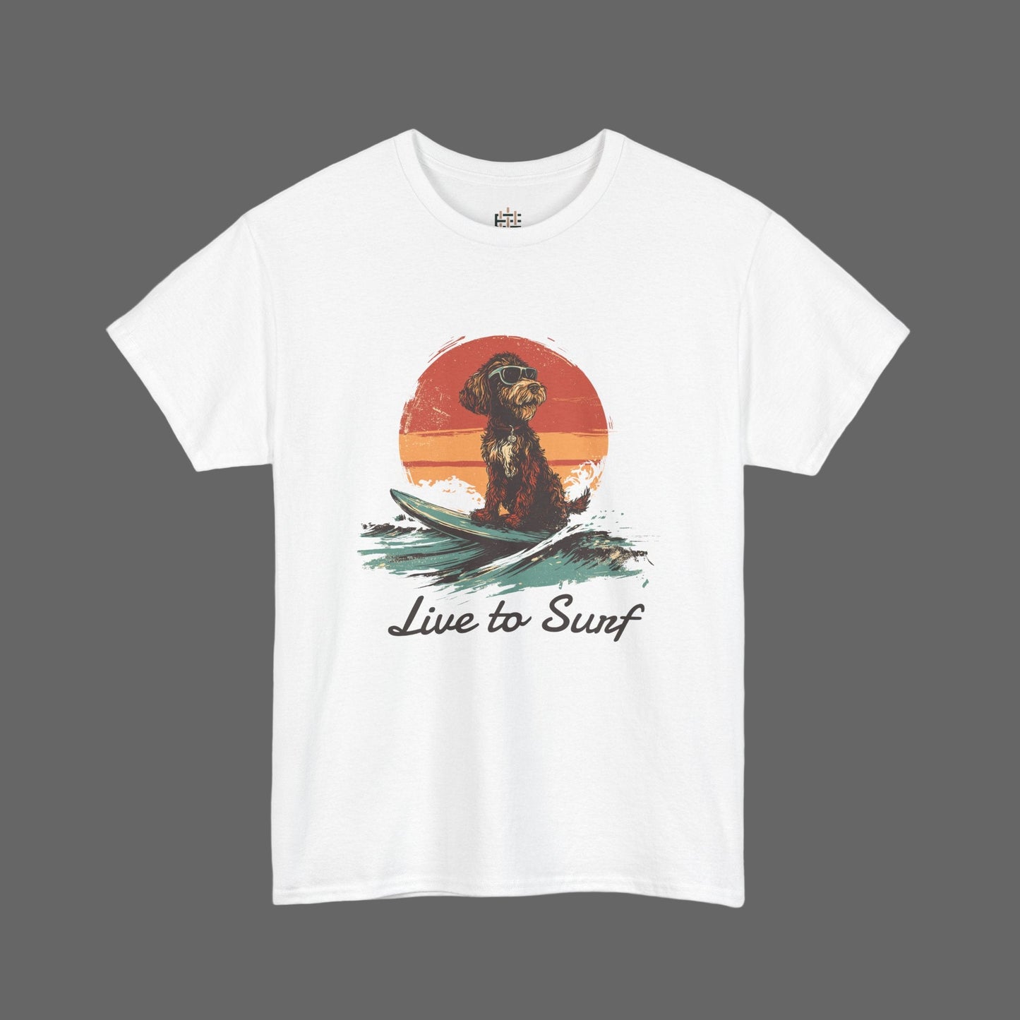 White t-shirt with a graphic of a dog on a surfboard and 'Live to Surf' text, set against a white background.