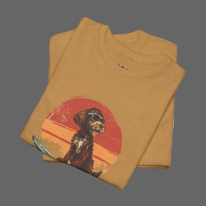 Folded mustard yellow t-shirt with a dog graphic on a white background