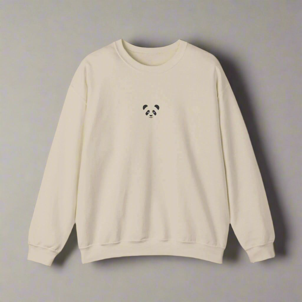Beige sweatshirt with a small panda design on a white background